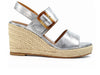 Lunar Rochester JLH507-Grey metallic wedge sandals with double straps and buckles, resting on a woven platform, outer view