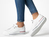 Paul Green Super Soft 5017-213 white leather sneakers. platform sole, lace-up design, and red & blue stripe detail model